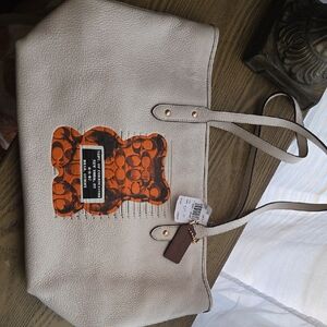 Coach Cream Tote with Orange Bear Motif